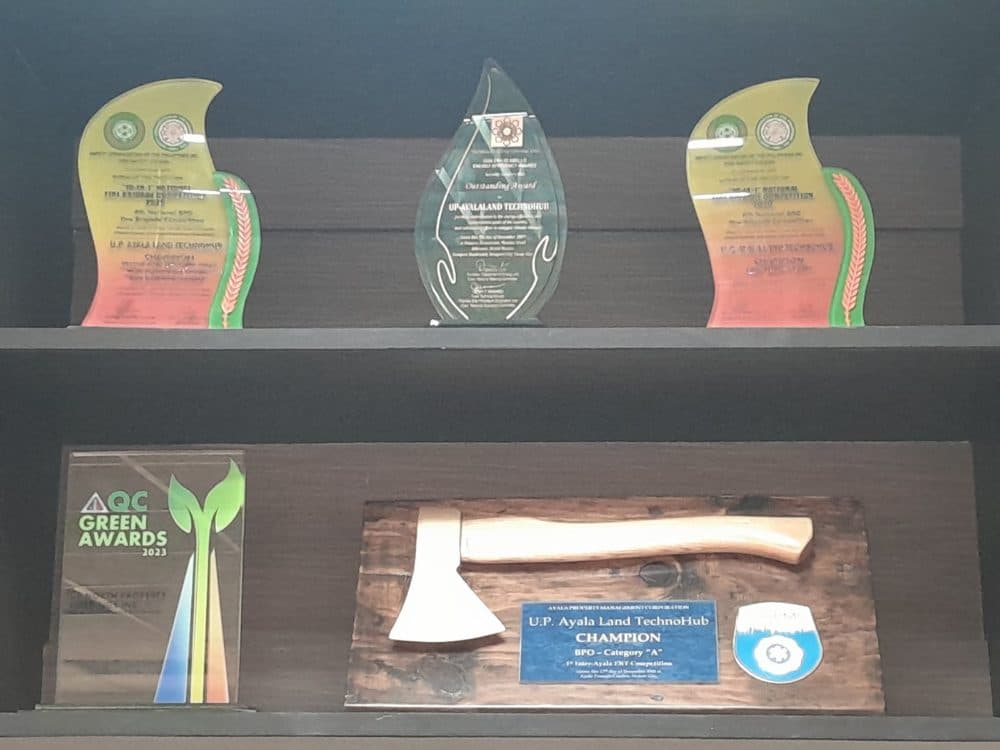 Shelf of Eaglewatch award trophies and plaques